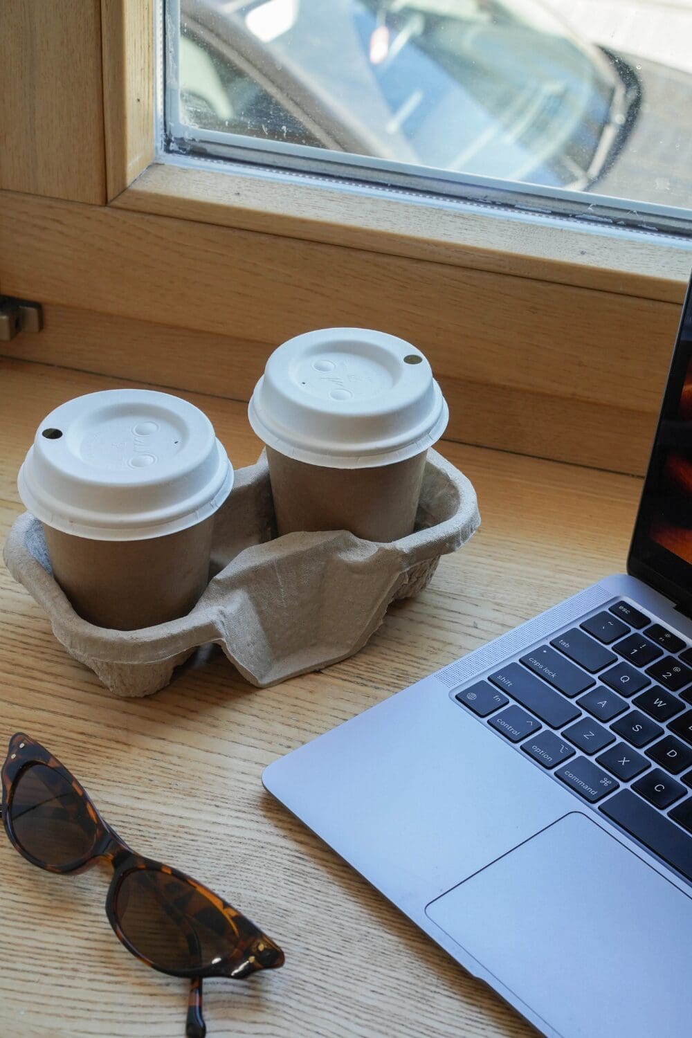 Two cups symbolising collaboration and captain purser partnership on a superyacht.