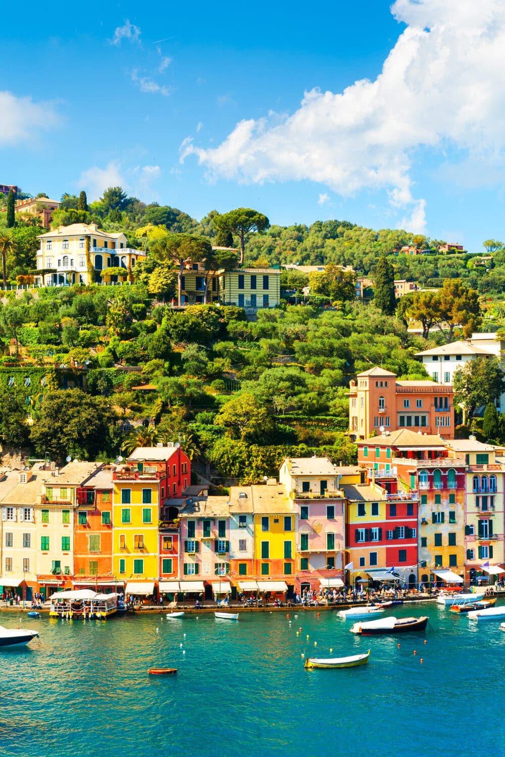 View of Portofino, Italy — the colourful harbour and hillside villas seen during a luxury yachting season supported by The Purser Desk.